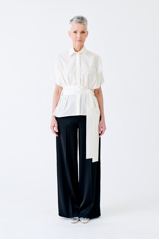 wingate collection tello white top on female model with silver slippers front