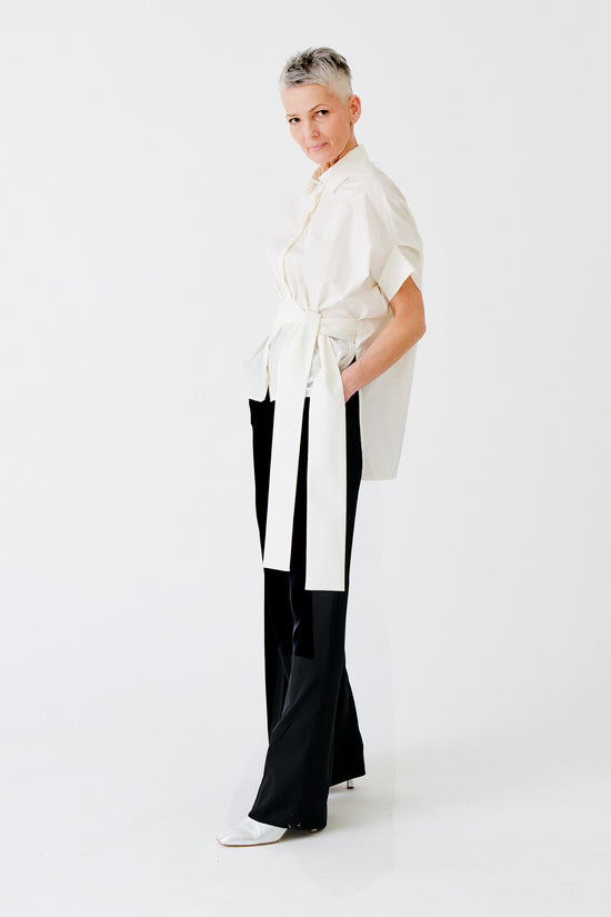 wingate collection tello white top on female model with silver slippers dynamic