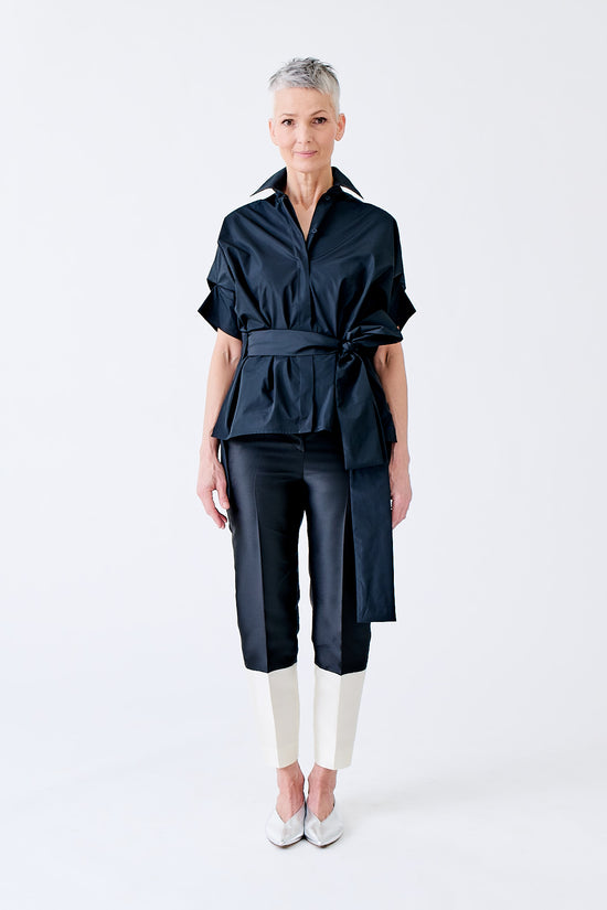 wingate collection tello black top on female model with silver slippers front