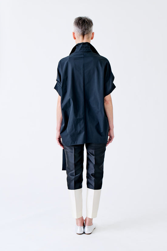 wingate collection tello black top on female model with silver slippers back