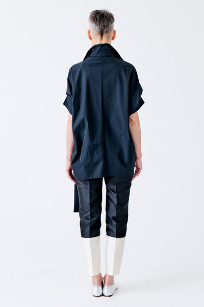 wingate collection tello black top on female model with silver slippers back