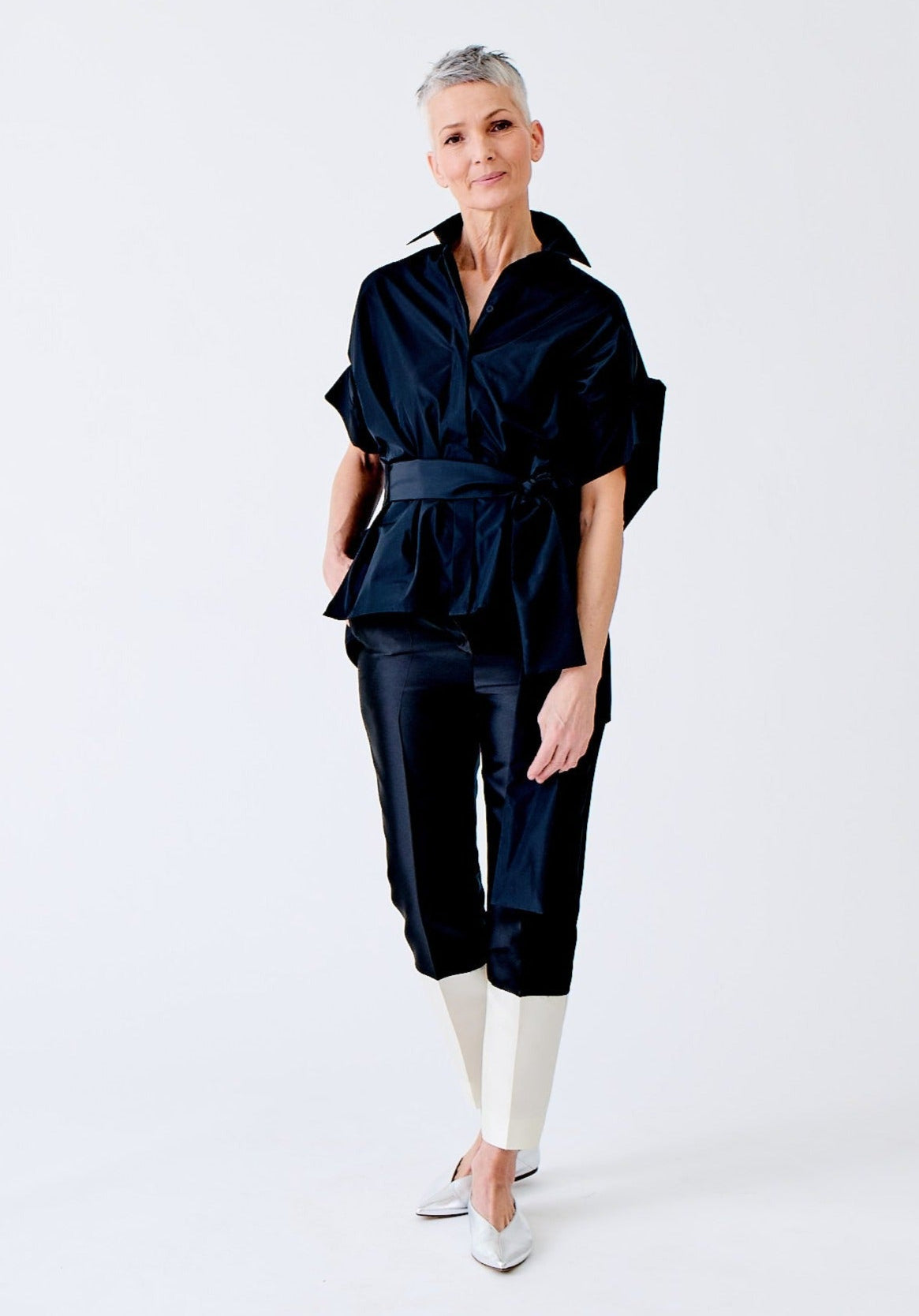 wingate collection tello black top on female model with silver slippers dynamic