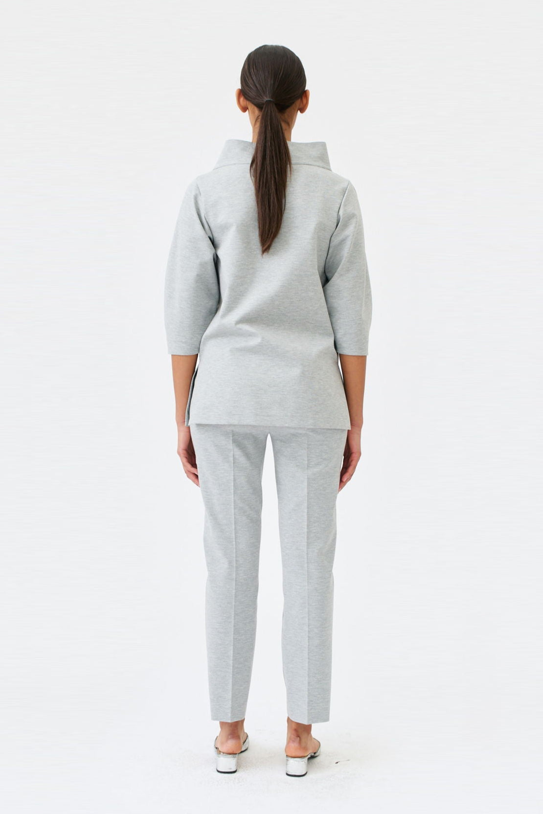 wingate collection teno silver top on female model with silver slippers back