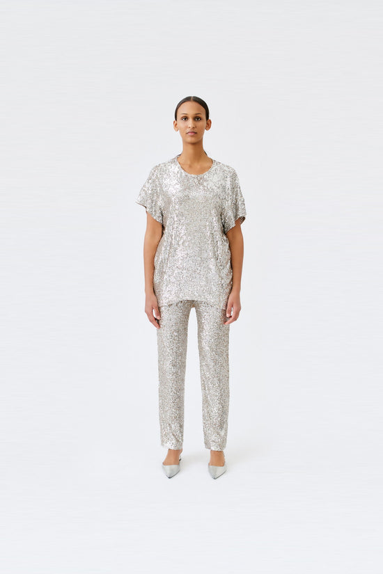 wingate collection tia silver top on female model with silver slippers front