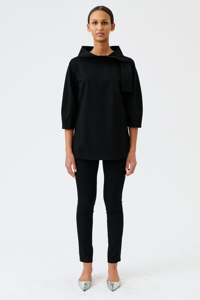 wingate collection teno black top on female model with silver slippers front