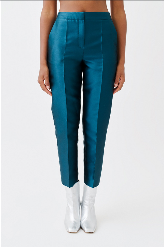 wingate collection peyti blue teal pants on female model with silver boots front