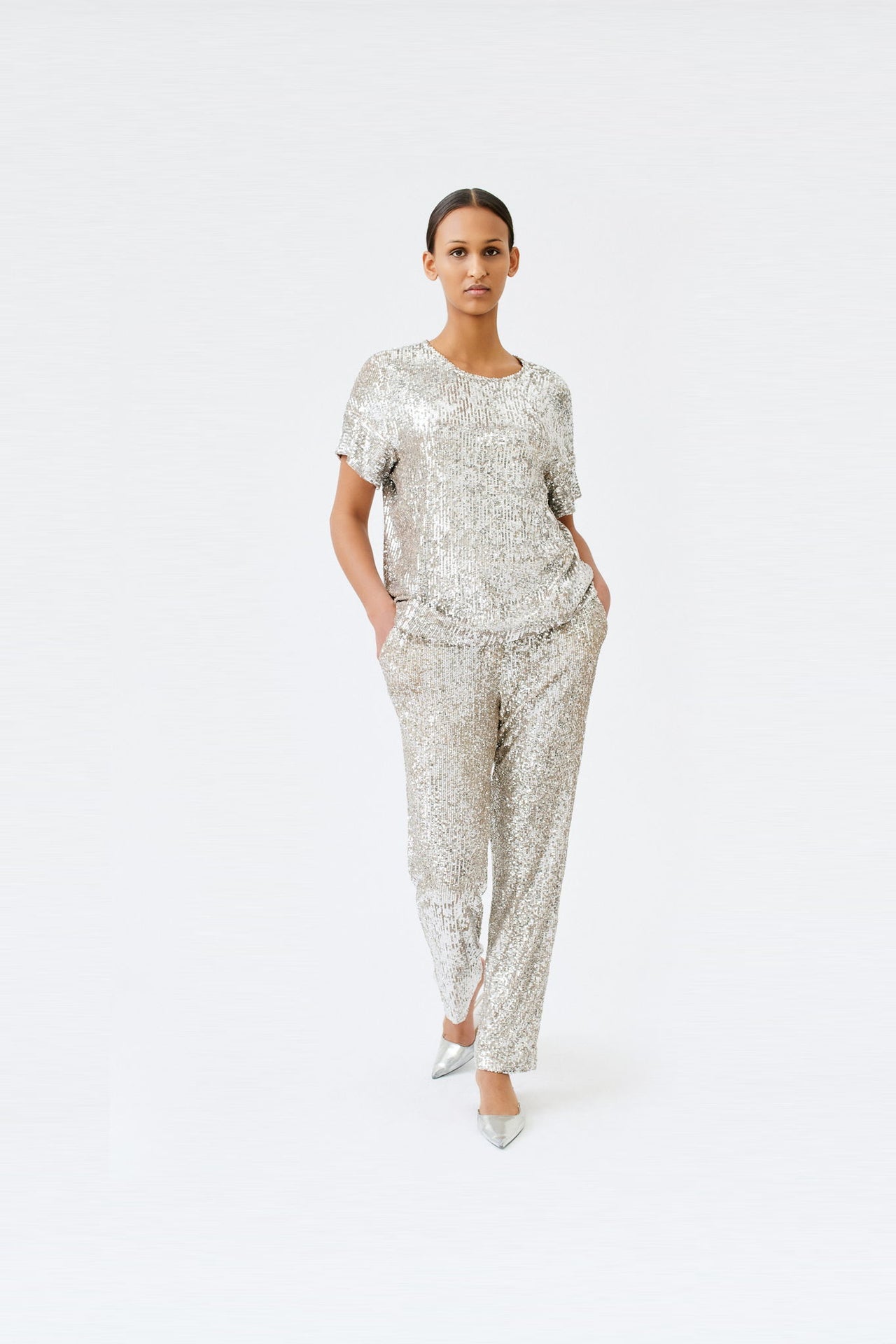 wingate collection tia silver top on female model with silver slippers dynamic