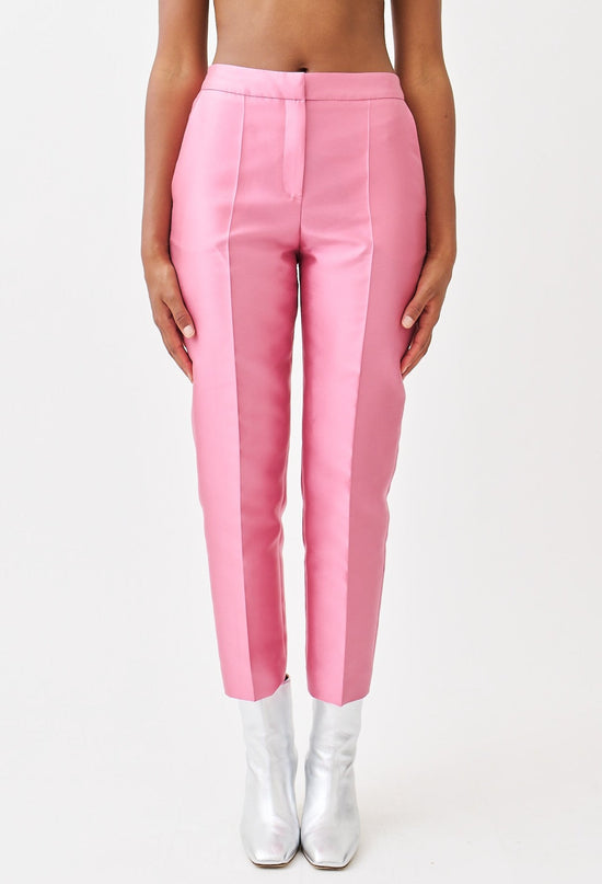 wingate collection peyti pink pants on female model with silver boots front