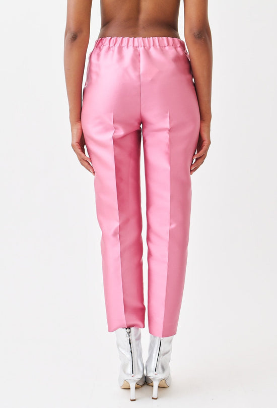 wingate collection peyti pink pants on female model with silver boots back